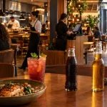 Restaurante com refeição preparada, bebidas e delivery representa os diferentes tratamentos do IBS e da CBS previstos para o setor de alimentação